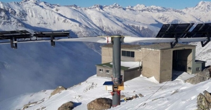 A Swiss startup is using reclaimed wind turbine blades instead of metal beams as horizontal supports for solar panels.