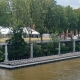 Transported 900 metres along the Seine, a 78 kW temporary photovoltaic power plant has docked at the Athletes’ Village