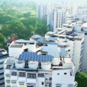 Microsoft will purchase solar power from panels on Singapore's public housing and government buildings, supporting its climate goals.