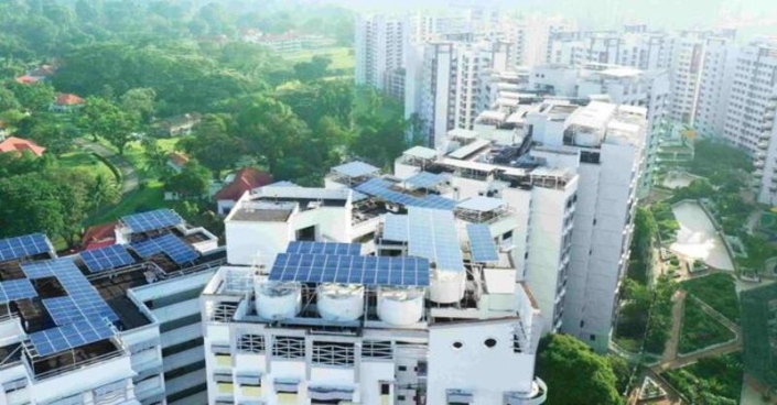 Microsoft will purchase solar power from panels on Singapore's public housing and government buildings, supporting its climate goals.