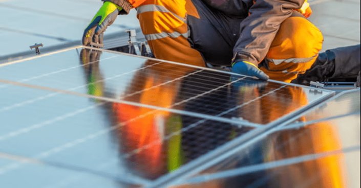 Old photovoltaic panels are stripped of aluminum and wires, then ground to recycle plastic, glass, silicon, silver, and copper.